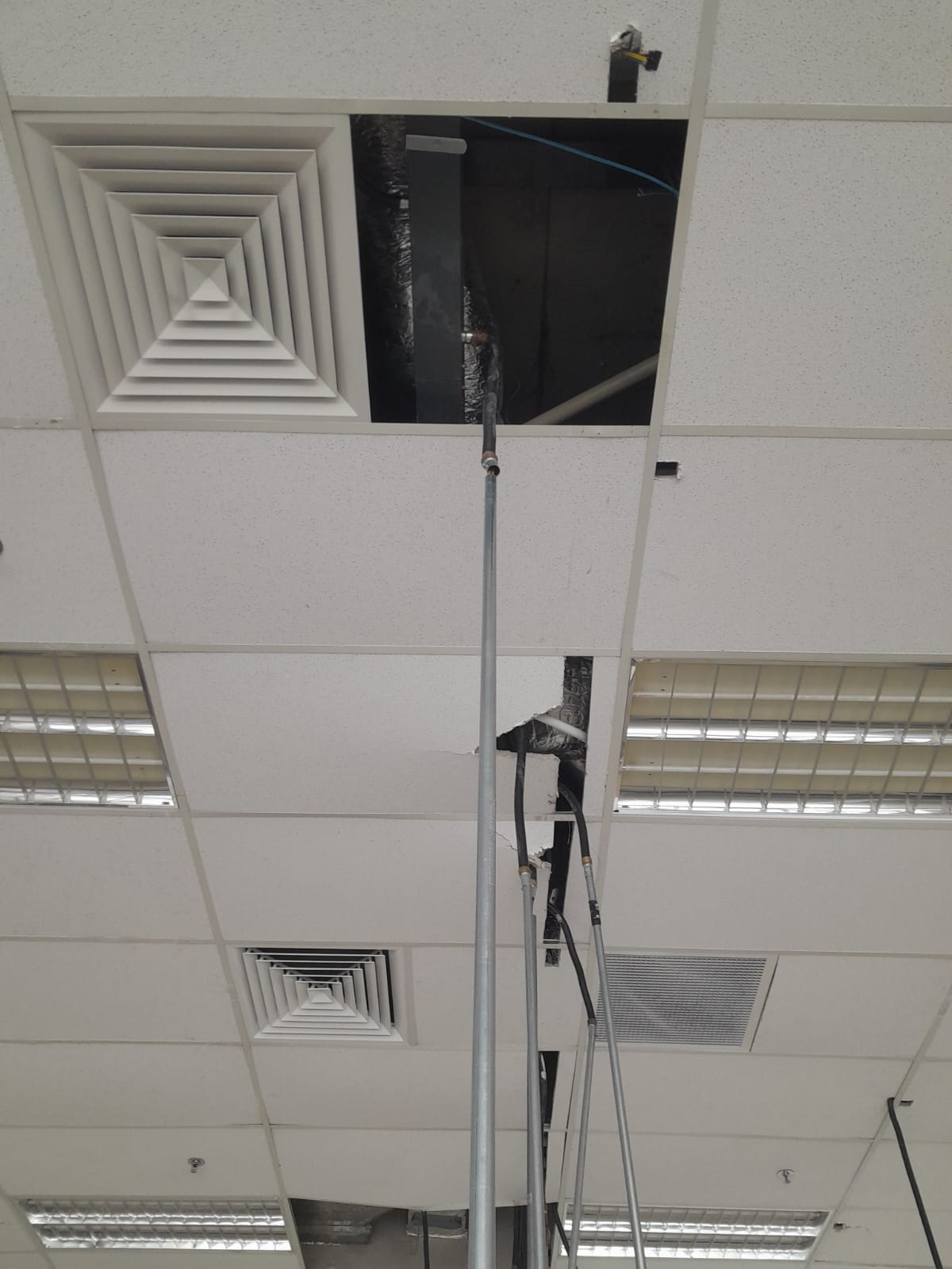 AR Ceiling Partition Singapore — T-bar grid suspended ceiling installation | Ceiling Partition Singapore